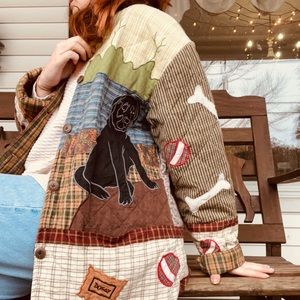 Hand quilted dog jacket, size medium.